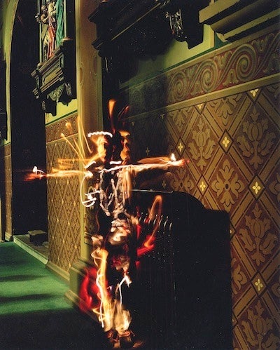 Part of a series in Catholic Chruch. This is one of the stations where you stop to pray. Varying line exposure which pushes the colors into very crazy places. The floor has got a green carpet, and I've drawn in the figure of Christ on the Cross with a flashlight. 